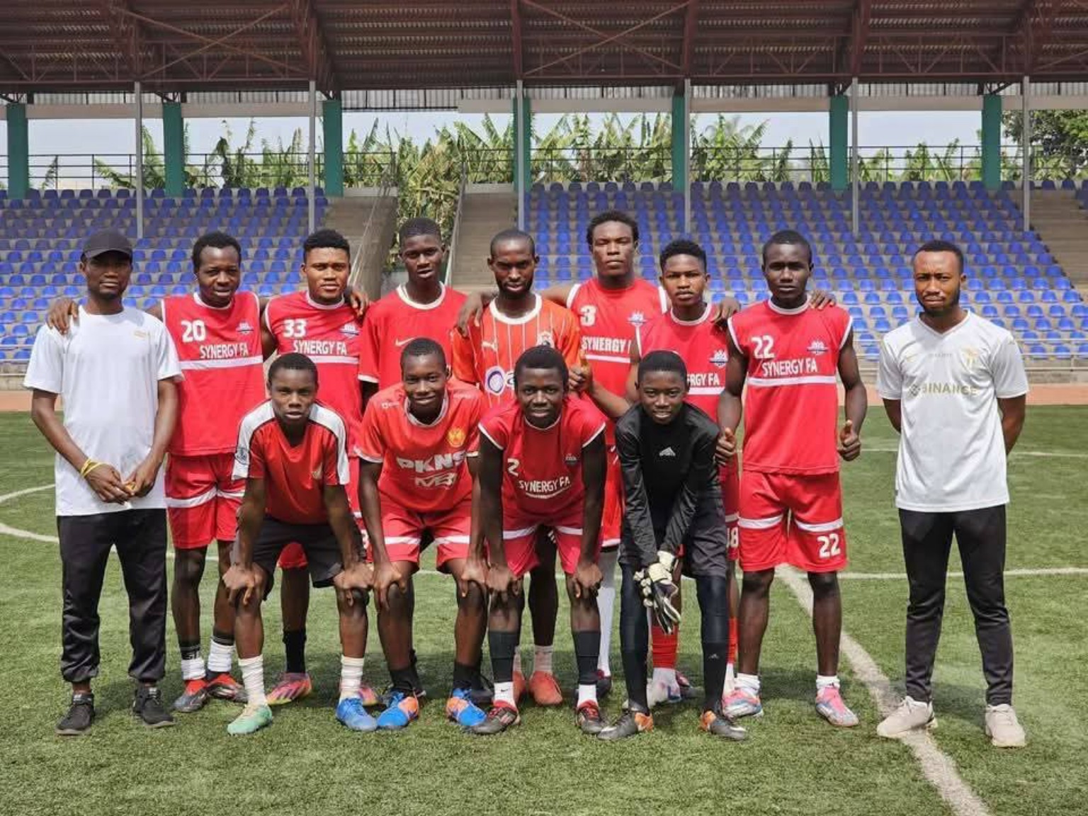 Synagy FC red football jerseys made by IUGWU VENTURES